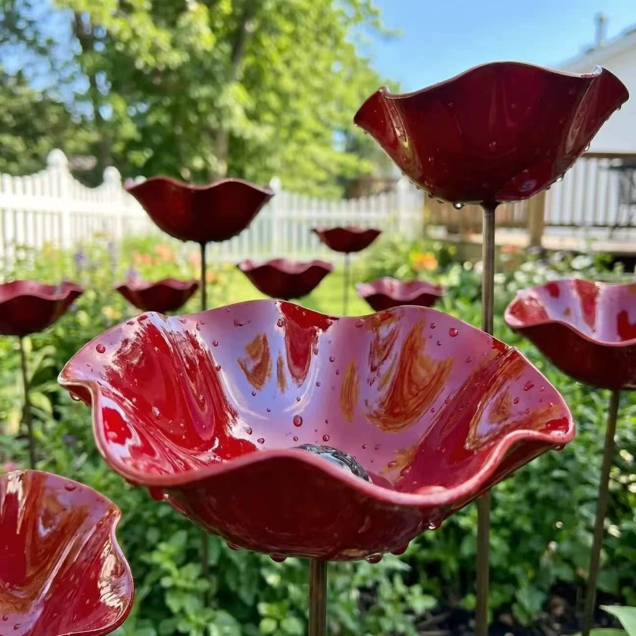 Blomsterfuglebade i have — samling